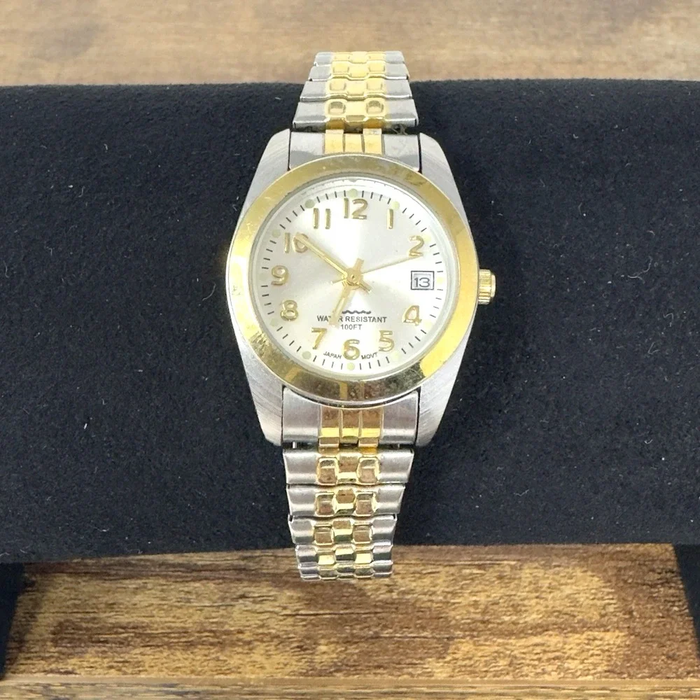 Geneva Womens Gold Tone Date Watch Water Resistant 100m Works Great
